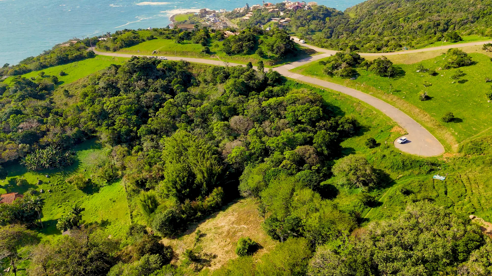 Loteamento com vista para o mar · terreno verde