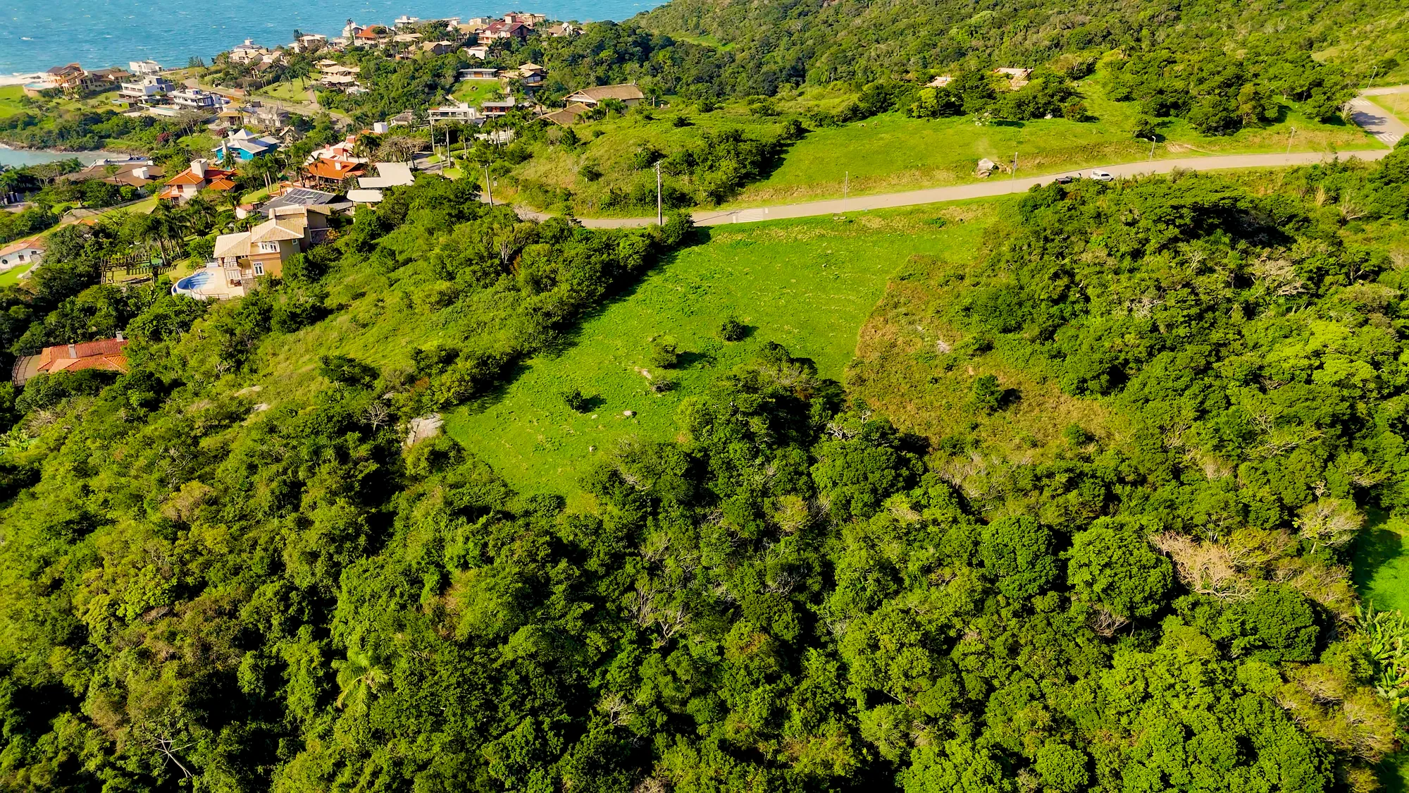 Loteamento com vista para o mar · terreno encosta